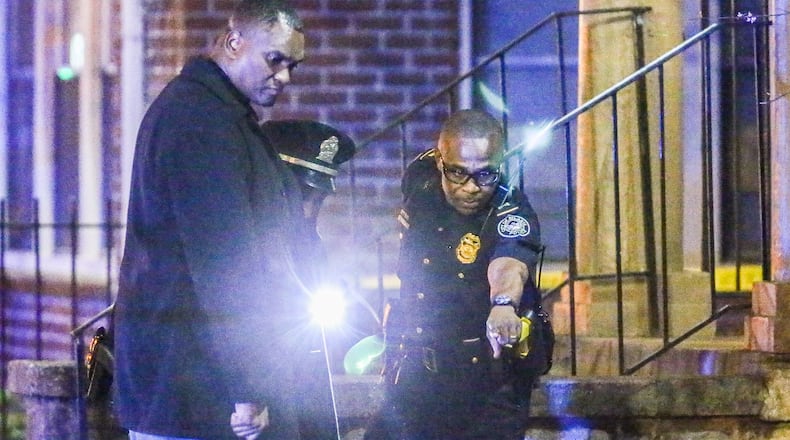 Atlanta police investigate after a man was shot multiple times on Boulevard. JOHN SPINK / JSPINK@AJC.COM