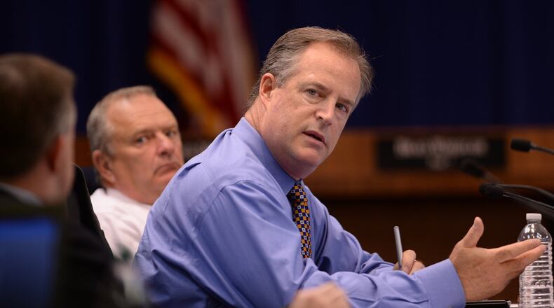 Preceded by three public hearings at 11 a.m. July 11 and noon and 6:30 p.m. July 19, Cobb County Board of Education members will decide, during their 7 p.m. July 19 meeting, whether to increase property tax rates by 7.48 percent - though keeping the same rate of 18.9 mills. Among those making that decision will be Cobb Board of Education members, left to right, Board Chair Brad Wheeler and Scott Sweeney. AJC file photo