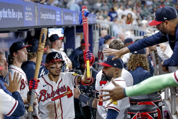 Mauricio Dubon celebrates his second straight game with a homer. (Erik S. Lesser/AP)