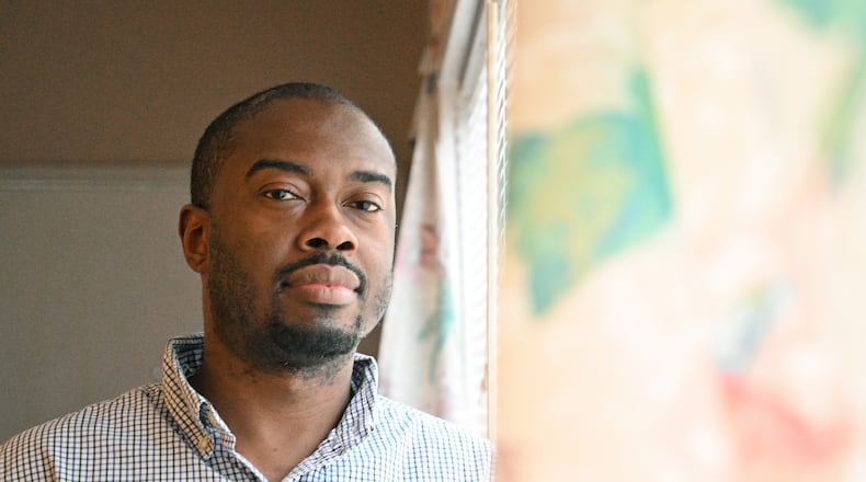 February 18, 2021 Hapeville - Portrait of Jason Butler, an Atlanta native and 2008 Savannah State University graduate, at his apartment home in Hapeville on Thursday, February 18, 2021. Jason Butler saw his student loan debt rise in part because he couldn't find a job after graduation. He created a website that shares money-saving tips to help college students and others not to make some of the financial mistakes he made. (Hyosub Shin / Hyosub.Shin@ajc.com)