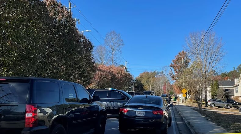 A man pulled from a crashed vehicle Friday morning in DeKalb County had been shot to death, according to police.