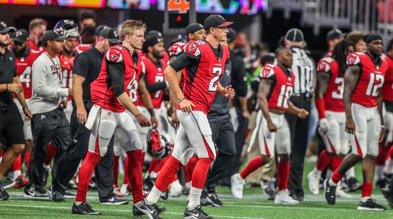 August 26, 2017 Atlanta: Atlanta Falcons quarterback Matt Ryan (2) runs off the field following the loss to the Cardinalson Saturday, Aug. 26, 2017 at the opening of the brand new Mercedes Benz Stadium and pre-season NFL game between the Atlanta Falcons and the Arizona Cardinals. JOHN SPINK/JSPINK@AJC.COM