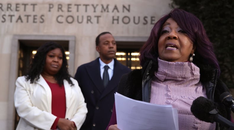 Georgia election workers Ruby Freeman and her daughter, Shaye Moss, speak outside of the E. Barrett Prettyman U.S. District Courthouse on Dec. 15 in Washington, D.C. They are seeking damages from The Gateway Pundit, which spread false allegations of voting fraud against Freeman and Moss. The Gateway Pundit filed for bankruptcy last week. (Alex Wong/Getty Images/TNS)