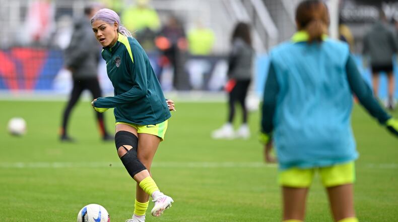 Washington Spirit forward Trinity Rodman warms up before a NWSL semifinal women's soccer match against Portland Thorns FC, Saturday, Nov. 15, 2025, in Washington. (AP Photo/John McDonnell)