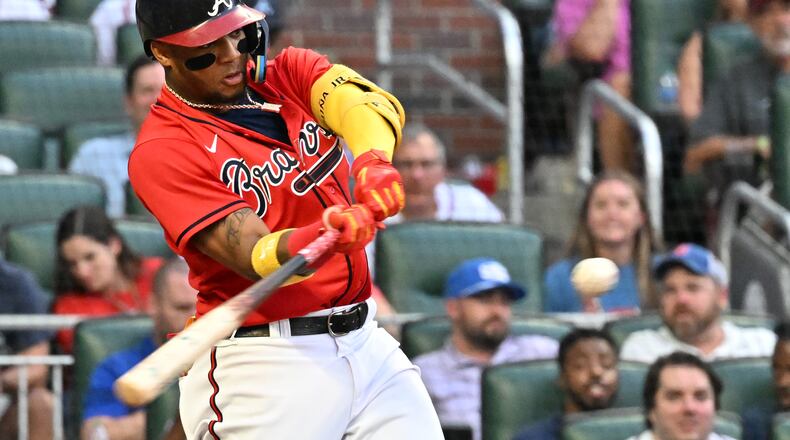 Braves' right fielder Ronald Acuna Jr. (13) hits a 3-run home run in the second inning at Truist Park on Friday, July 8, 2022. (Hyosub Shin / Hyosub.Shin@ajc.com)