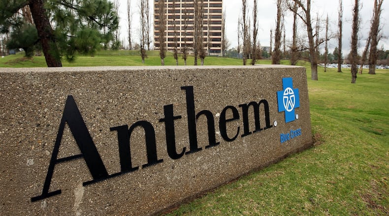 Anthem, the parent company of Blue Cross Blue Shield of Georgia, has weighed pulling out of health insurance markets across the country. This summer, it decided to partially pull out of Georgia’s individual market. (Photo by David McNew/Getty Images)