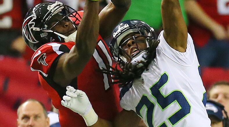 Seahawks cornerback Richard Sherman matched up against Falcons wide receiver Julio Jones in the NFL Divisional playoff game at the Georgia Dome Sunday, Jan. 13, 2013, in Atlanta.