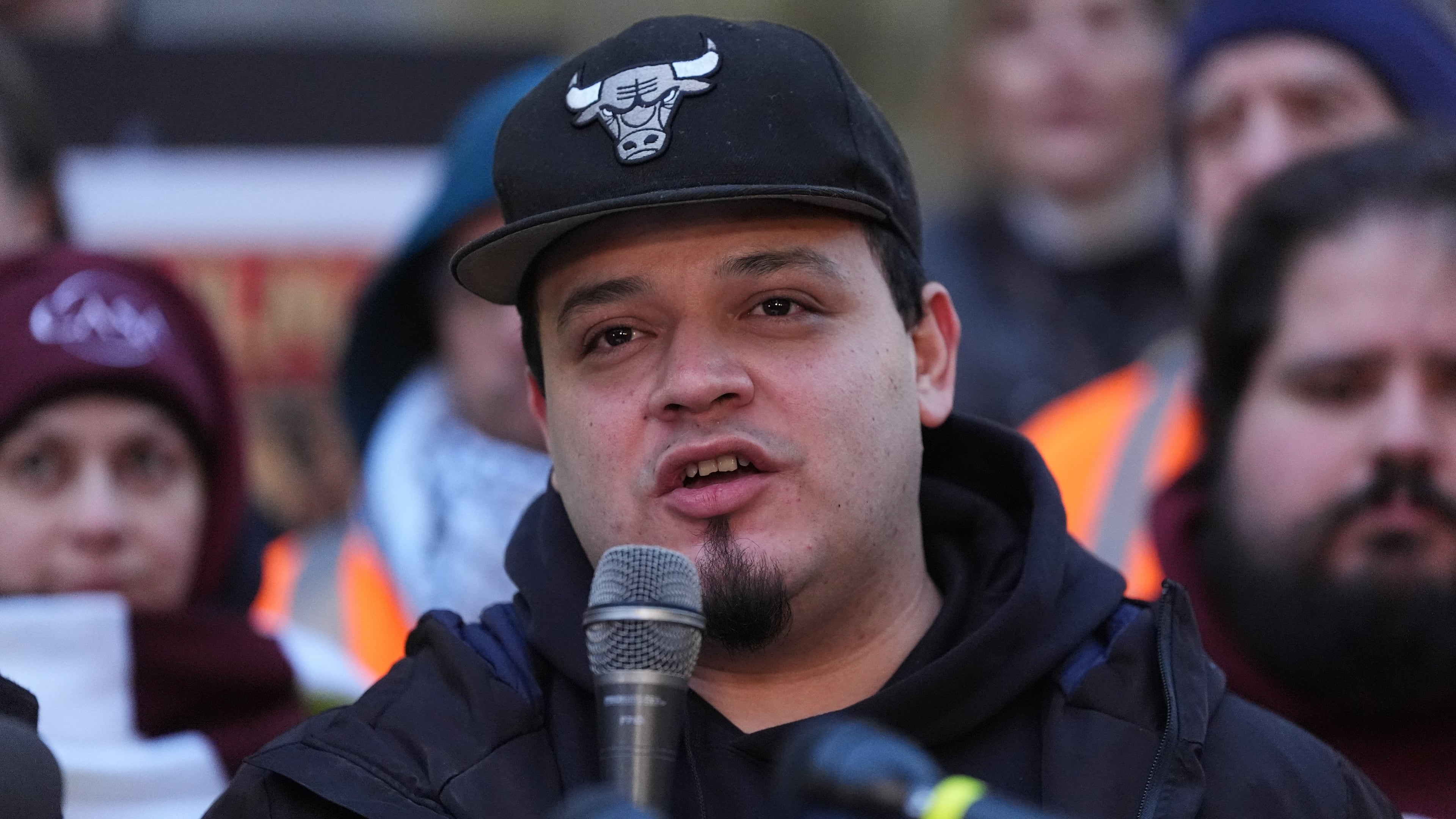 Kilmar Abrego Garcia speaks during a rally ahead of a mandatory check at the Immigration and Customs Enforcement office in Baltimore, Friday, Dec. 12, 2025, after he was released from detention on Thursday under a judge's order. (AP Photo/Stephanie Scarbrough)
