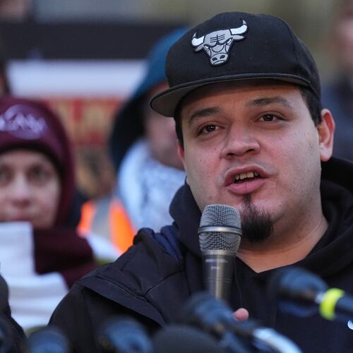 Kilmar Abrego Garcia speaks during a rally ahead of a mandatory check at the Immigration and Customs Enforcement office in Baltimore, Friday, Dec. 12, 2025, after he was released from detention on Thursday under a judge's order. (AP Photo/Stephanie Scarbrough)