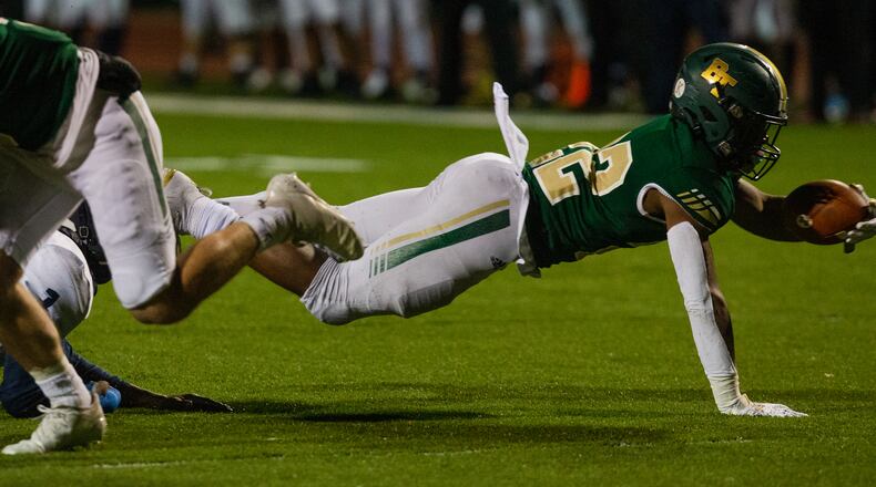 Blessed Trinity running back Justice Haynes stretches into the end zone for a touchdown during Friday's state playoff game against Decatur in Roswell.