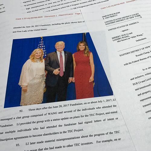 FILE - The complaint and affidavit in support of an arrest warrant against Sherry Xue Li and Lianbo "Mike" Wang is photographed on Monday, July 18, 2022. (Department of Justice via AP, File)
