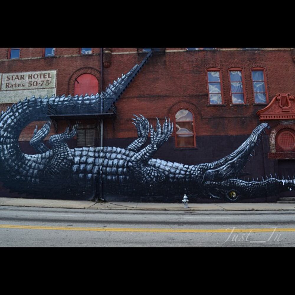 Artists from around the world paint murals around Atlanta