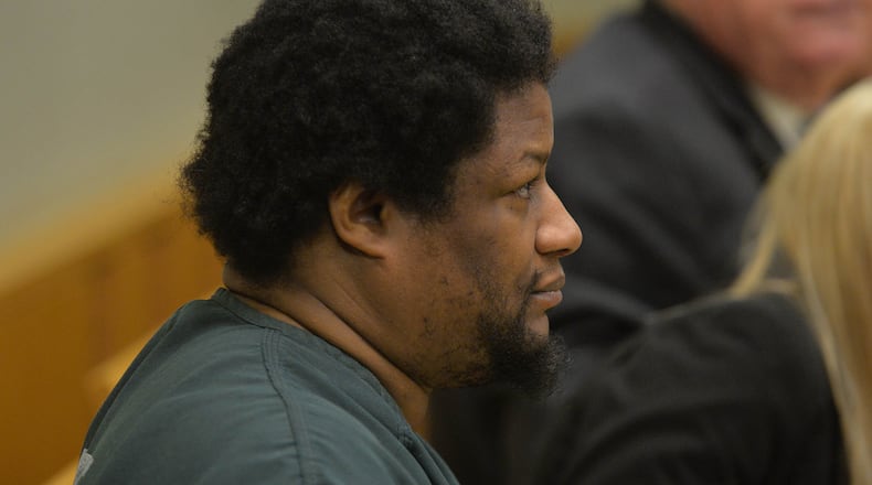 Calvin Mcintosh listens in this December 2014 photo as Chief Magistrate Kristina Hammer Blum binds him over for trial during a hearing for him and his daughter, Najlaa McIntosh, who are charged with starving his child to death and withholding food from the child's 21-year-old mother, who weighed 59 pounds when she was found.