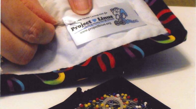 For children in need, make new handmade blankets at 1 p.m. Nov. 4 at Kemp Memorial Library, 4029 Due West Road, Marietta. (Courtesy of Project Linus)