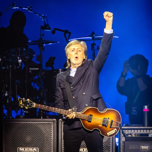 Paul McCartney plays to a nearly sold-out State Farm Arena in Atlanta on Sunday, Nov. 2, 2025, taking fans on a hit-filled journey spanning McCartney's decadeslong career. McCartney played for two hours and 30 minutes with a seven-piece band backing him. (Ryan Fleisher for the AJC)