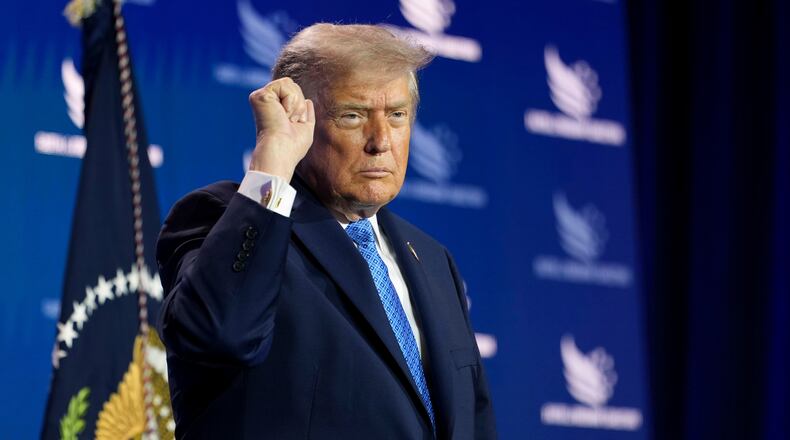 President Donald Trump addresses the crowd as he departs after speaking at the Faith & Freedom Coalition's policy conference at the Washington Hilton, Friday, June 26, 2026, in Washington. (AP Photo/Julia Demaree Nikhinson)