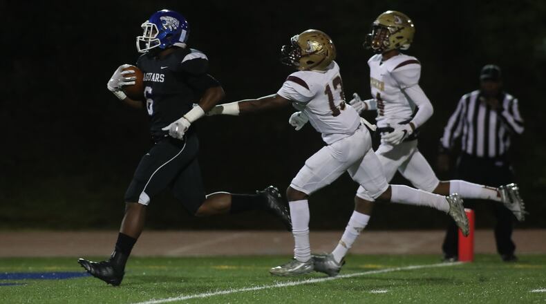 Stephenson running back Ryan Ingram scores a touchdown during last year’s game against Tucker. Stephenson defeated its DeKalb rival Tucker 30-24. (Branden Camp/Special)