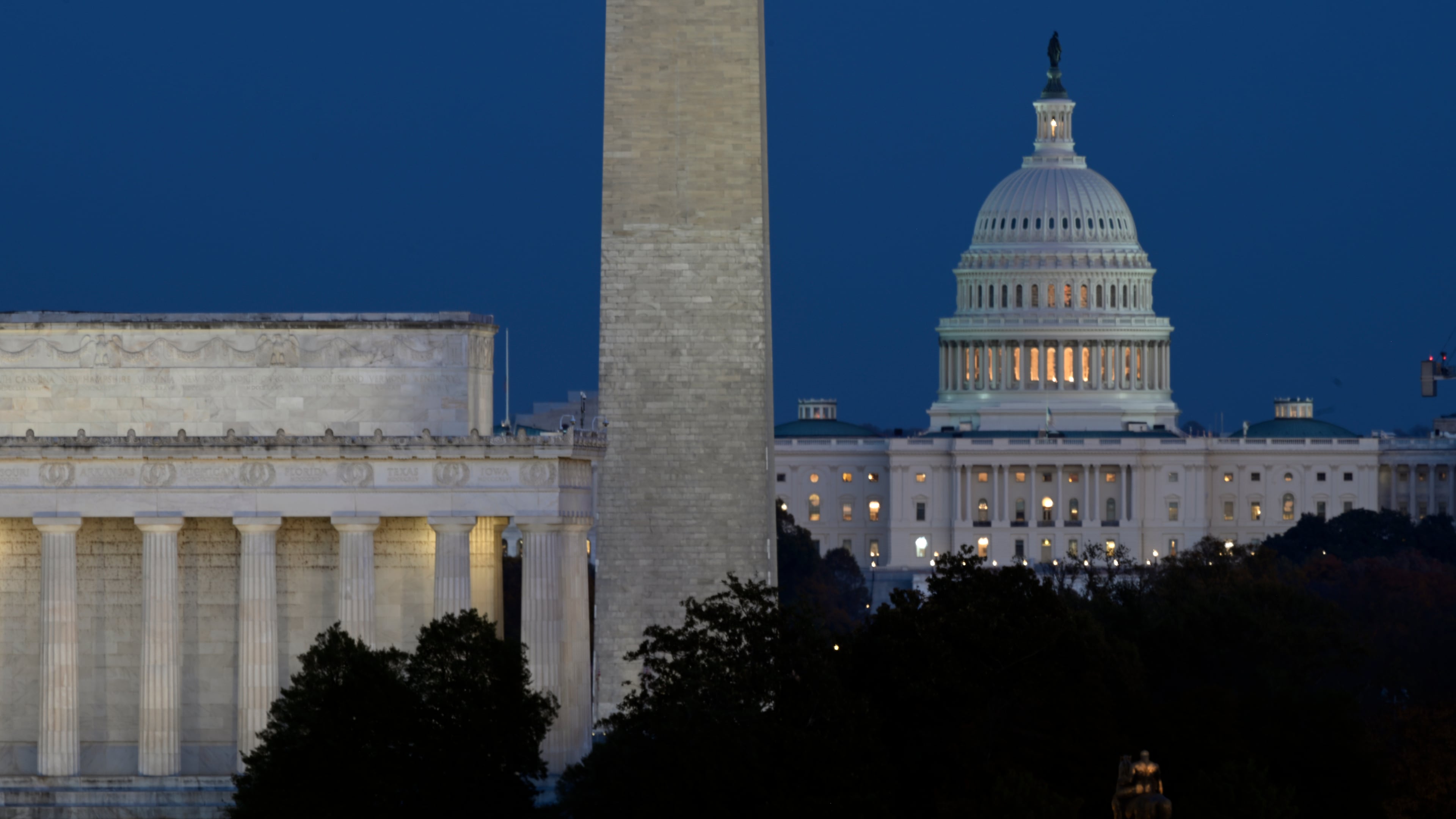 The Lincoln Memorial, Washington Monument and the U.S. Capitol in Washington, Tuesday, Nov. 4, 2025. (AP Photo/John McDonnell)