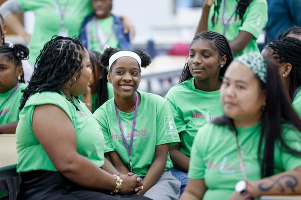 Students engage with Raioni Madison, the founder of 3D Girls, during an introductory activity on the first day of the 3D Girls summer camp at Ethos Classical Middle School on Monday, June 1, 2026. (Miguel Martinez/AJC)