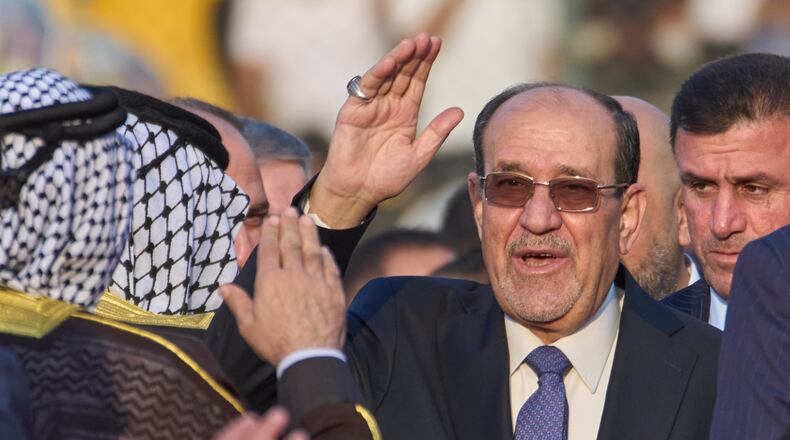 FILE - Former Iraqi Prime Minister Nouri al-Maliki arrives to his political block campaign rally before the parliamentary elections in Baghdad, Iraq, Friday, Nov. 7, 2025. (AP Photo/Hadi Mizban, File)