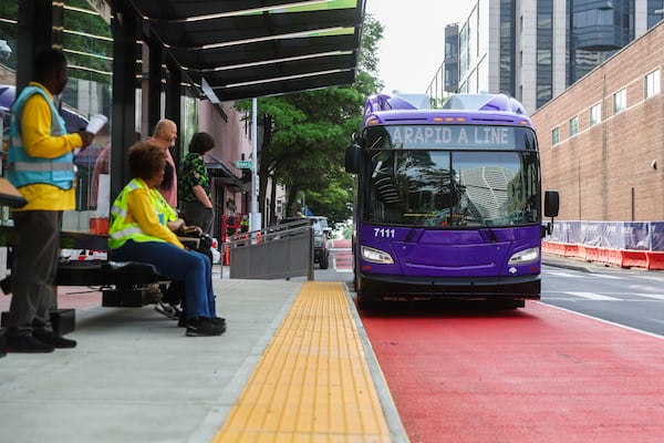 Purple bus goes in red lane. Not purple bus? No red lane. (Abbey Cutrer/AJC)