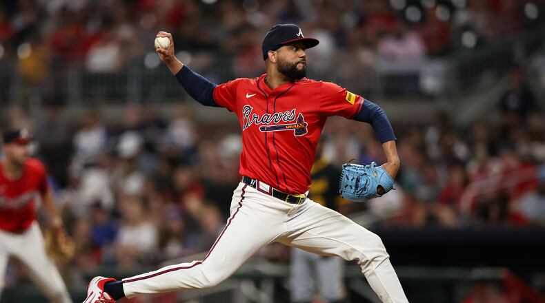Atlanta Braves pitcher Joel Payamps delivers in the sixth inning of a baseball game against the Pittsburgh Pirates, Friday, Sept. 26, 2025, in Atlanta. (AP Photo/Colin Hubbard)