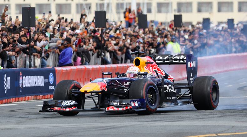 Oracle Red Bull Racing F1 car and Visa Cash App Racing Bulls F1 reserve driver Yuki Tsunoda takes part in a demonstration presented by Ford is a Formula One during the Red Bull Showrun in San Francisco on February 21, 2026. (Tayfun Coskun/Anadolu via Getty Images)