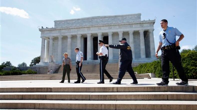 President-elect Joe Biden is planning a lighting ceremony at the Lincoln Memorial Reflecting Pool to honor those killed by the coronavirus the day before he is sworn into office Jan. 20. (AP Photo/Jacquelyn Martin)