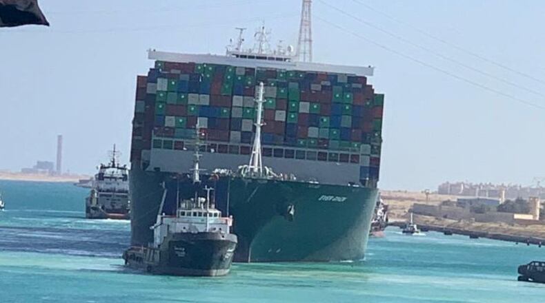 The Ever Given makes its way through the Suez Canal in Egypt after being freed Monday. The mammoth cargo ship blocking one of the world’s most vital maritime arteries was wrenched from the shoreline and finally set free Monday. (Suez Canal Authority via The New York Times)