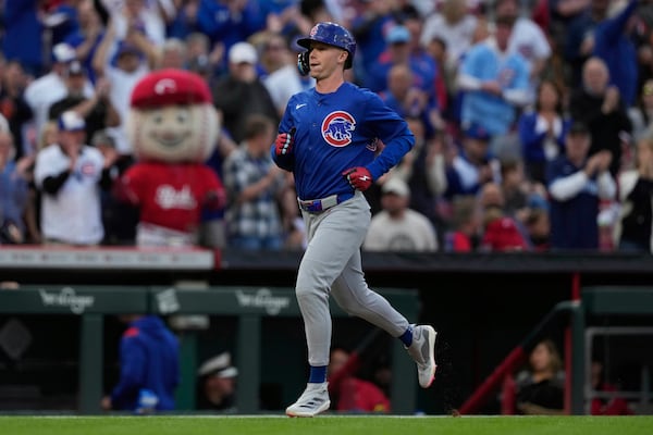 Chicago Cubs' Pete Crow-Armstrong rounds the bases after hitting a two-run home run in the fourth inning during a baseball game against the Chicago Cubs, Friday, May 23, 2025, in Cincinnati. (AP Photo/Carolyn Kaster)