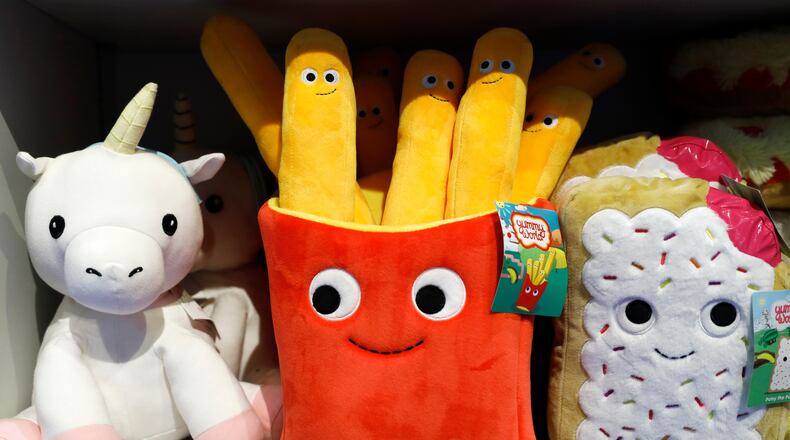 FILE - Plush toys are displayed at a Camp store in New York. Camp, Nov. 21, 2019. (AP Photo/Mark Lennihan, File)
