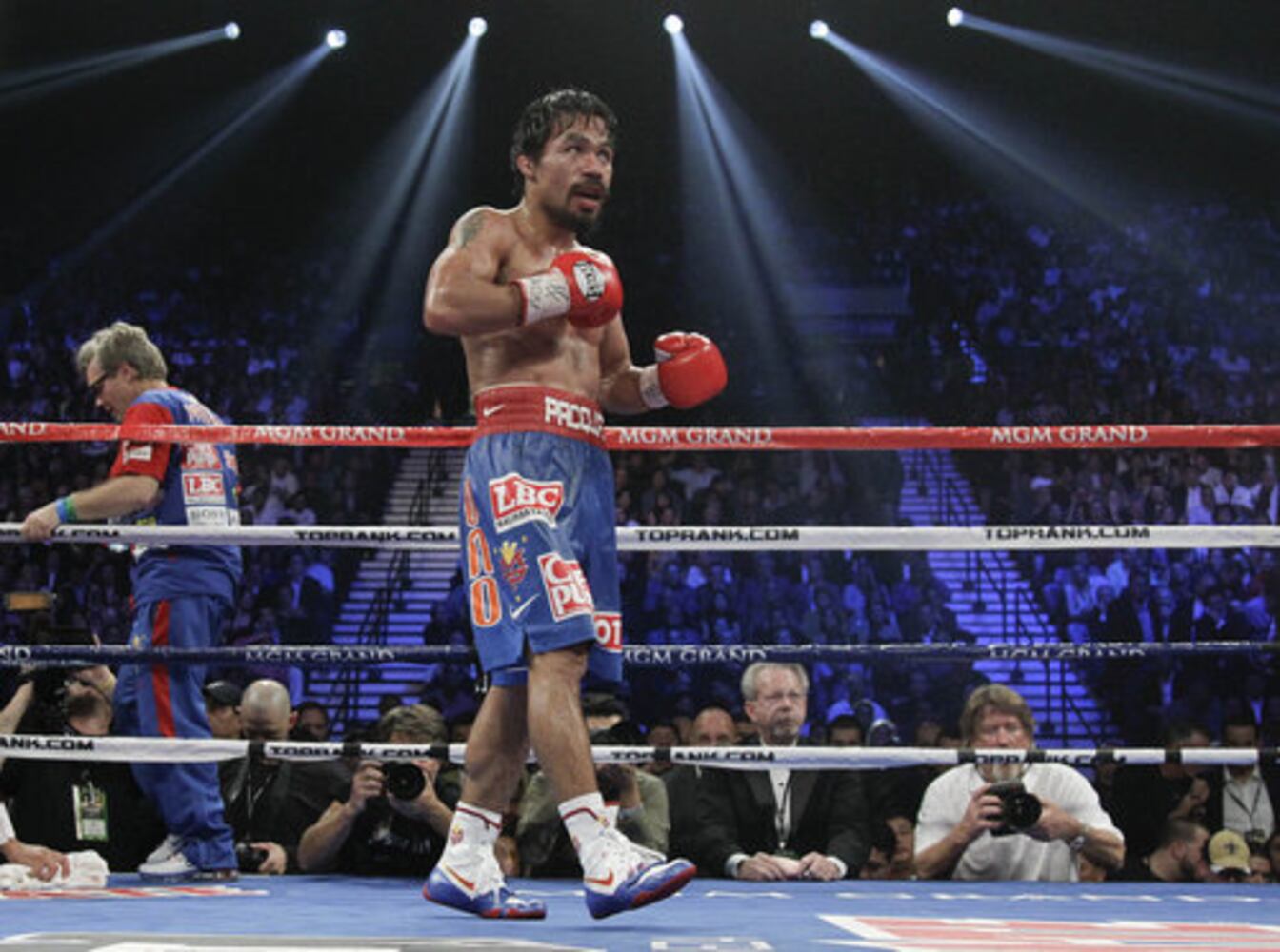Manny Pacquiao defeats Juan Manuel Marquez
