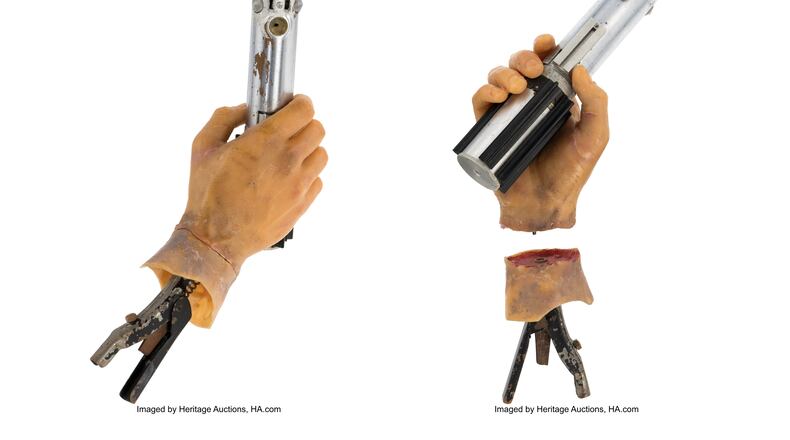 This combination of images released by Heritage Auctions show the light saber used on screen by Mark Hamill's character Luke Skywalker in the 1980 "Star Wars" sequel "The Empire Strikes Back." (Heritage Auctions via AP)