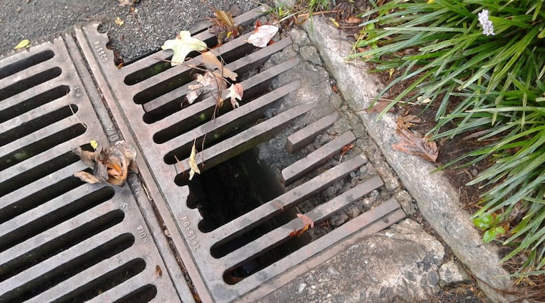 Mike Smith wants this hole fixed in the heart of the city. Photo/Mike Smith.