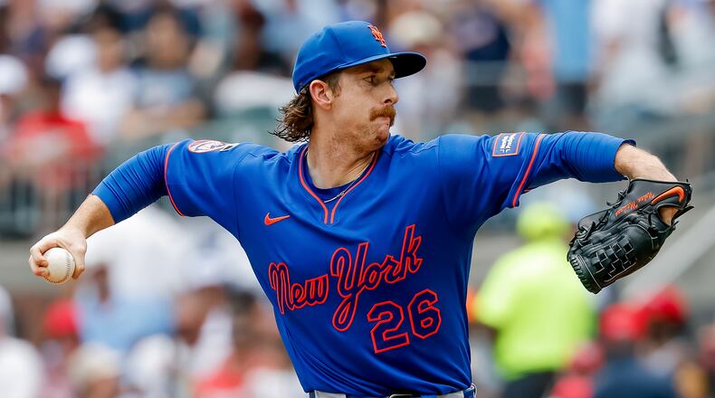 New York Mets pitcher Nolan McLean delivers to an Atlanta Braves batter during the first inning of a baseball game, Sunday, July 5, 2026, in Atlanta. (AP Photo/Erik S. Lesser)