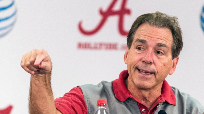 Alabama football coach Nick Saban gestures during a news conference, Wednesday, Nov. 18, 2015, at Naylor-Stone Media Suite in Tuscaloosa, Ala. (Vasha Hunt/AL.com via AP) MANDATORY CREDIT
