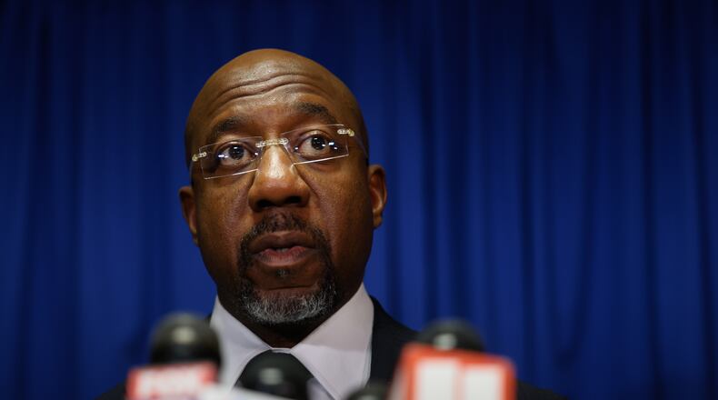 Democratic U.S. Sen. Raphael Warnock speaks at press conference before the state legislature convenes for a special session in Atlanta on June 17, 2026. (Arvin Temkar/AJC)