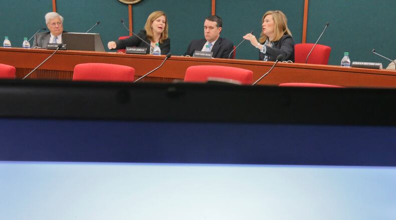 Members of the state ethics commission, seen at a 2014 meeting, are getting a new colleague. JOHN SPINK/JSPINK@AJC.COM
