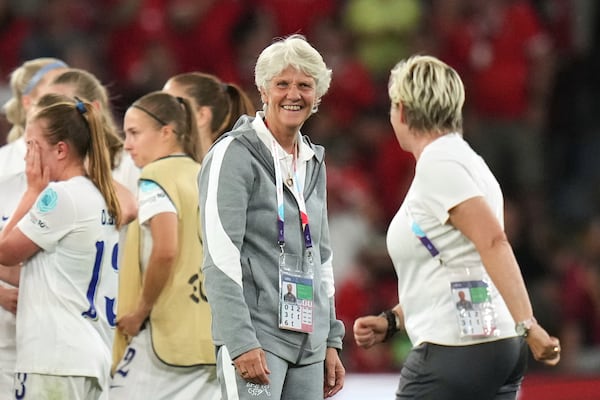FILE - Switzerland head coach Pia Sundhage smiles at the end of the Euro 2025, group A, soccer match between Finland and Switzerland at Stade de Geneve in Geneva, Switzerland, Thursday, July 10, 2025. (AP Photo/Alessandra Tarantino, File)