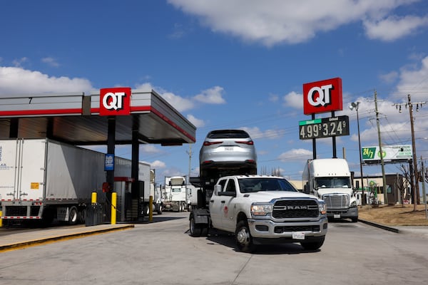 The price of diesel gas at the QuikTrip on Pleasantdale Road near Spaghetti Junction was at $5 on Monday. (Jason Getz/AJC)