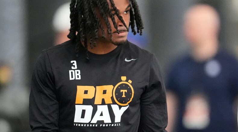 Tennessee defensive back Jermod McCoy walks onto the field for the school's NFL football pro day Tuesday, March 31, 2026, in Knoxville, Tenn. (AP Photo/George Walker IV)