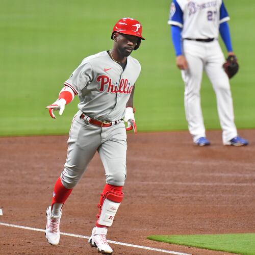 April 10, 2021 Atlanta - Philadelphia Phillies center fielder Andrew McCutchen (22) celebrates after he hit one run home run in the 5th inning at Truist Park on Saturday, April 10, 2021. Atlanta Braves won 5-4 over Philadelphia Phillies. (Hyosub Shin / Hyosub.Shin@ajc.com)