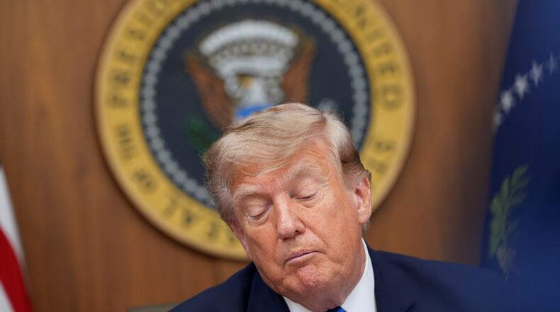 President Donald Trump listens during a cabinet meeting, Friday, July 31, 2026, at Camp David, the presidential retreat, near Thurmont, Md., Friday, July 31, 2026. (AP Photo/Jacquelyn Martin)