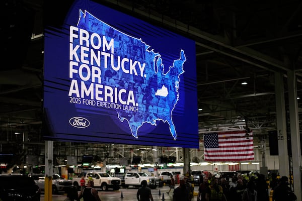 Workers gather at the Ford Motor Company Kentucky Truck Plant for the 2025 Ford Expedition launch, Wednesday, April 30, 2025, in Louisville, Ky. (AP Photo/Carolyn Kaster)