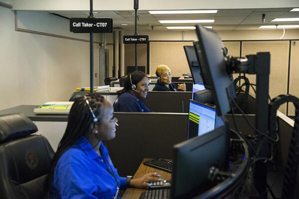 Call takers at the Fulton County Emergency Communications office handle 9-1-1 calls from much of south Fulton, including the cities of Fairburn, South Fulton, Union City, Chattahoochee Hills and Palmetto. Grady handles calls from the cities of East Point and College Park, also in the south Fulton region. (Alyssa Pointer/alyssa.pointer@ajc.com)