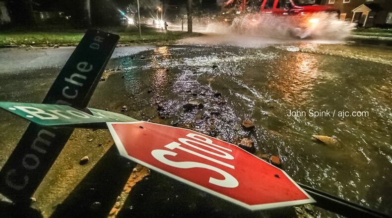 Authorities have not said what caused the break at the corner of Comanche Drive and Brockett Road. The stop sign for that intersection was on the ground.