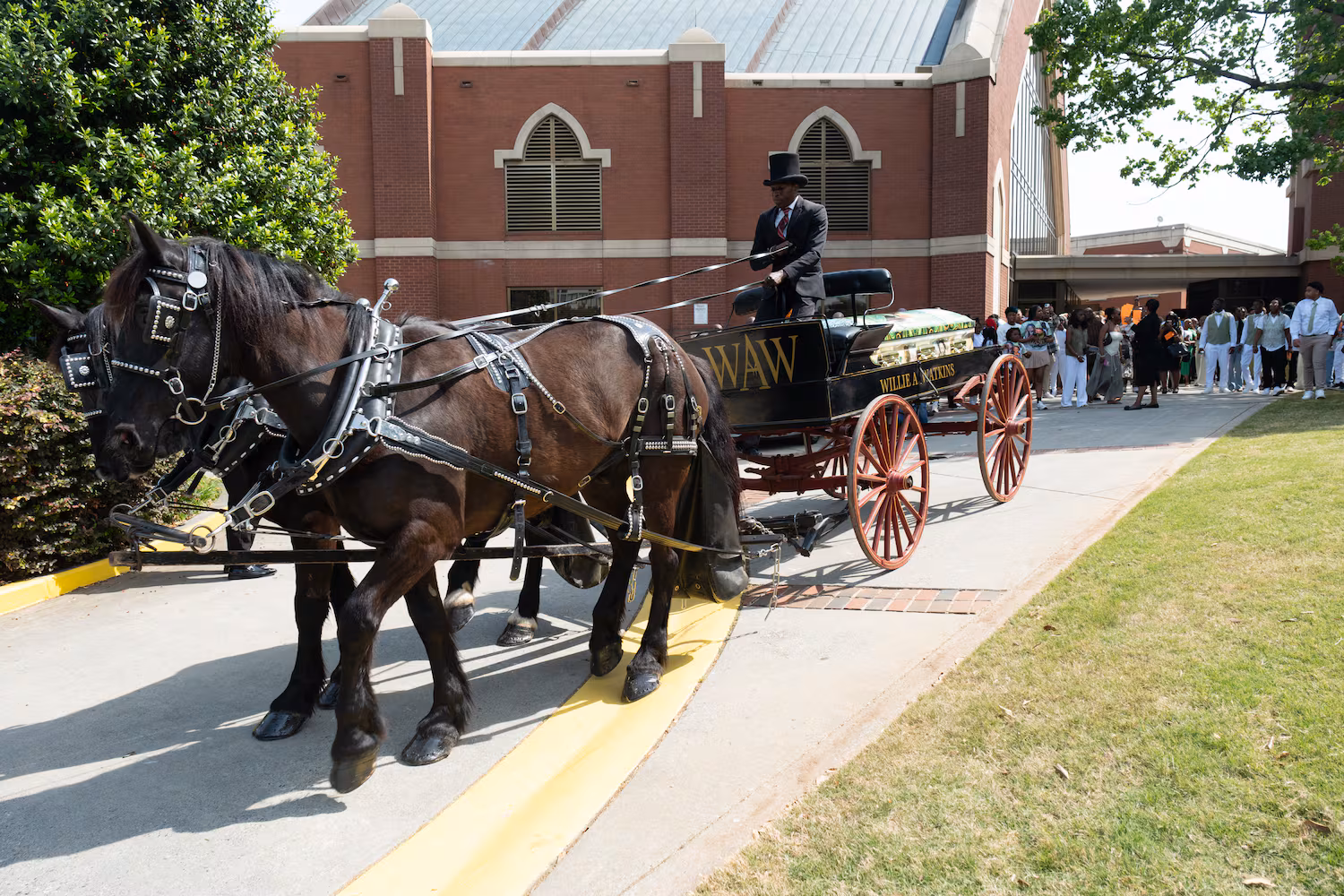 Tianah Robinson’s casket leaves Ebenezer  Baptist Church following a celebration of life Saturday, April 18, 2026, in Atlanta. Robinson was killed during a shooting at Piedmont Park following 404 Day celebrations. (Ben Gray for the AJC)