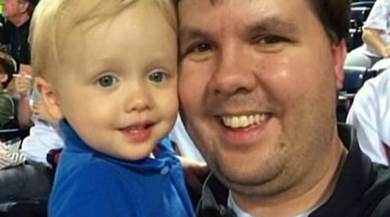 Ross Harris and his son Cooper take in a Braves game. (Facebook photo)