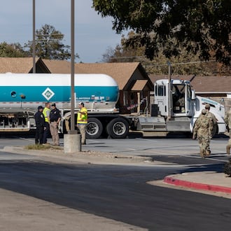 Crews begin checking the Airgas tanker on Thursday, Nov. 13, 2025 that leaked in the parking lot of the Holiday Inn Express in Weatherford, Okla. the previous night and caused mandatory evacuations. (AP Photo/Alonzo Adams)
