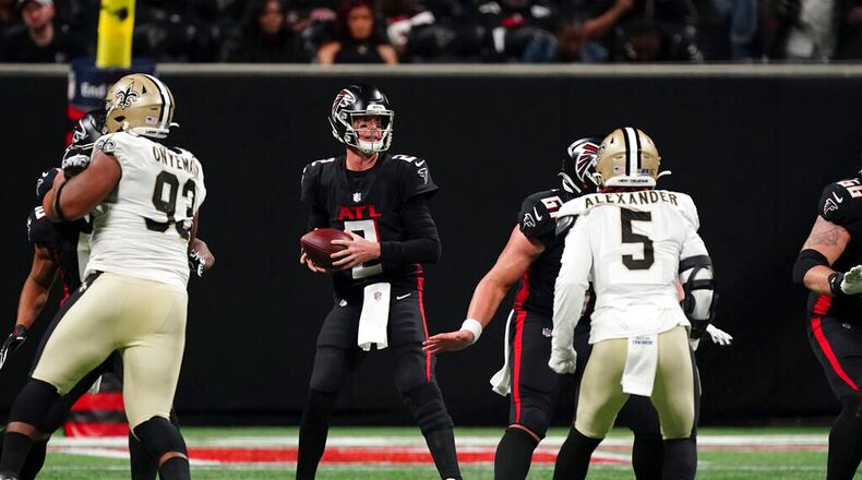 Atlanta Falcons quarterback Matt Ryan (2) works in the pocket against the New Orleans Saints during the second half of an NFL football game, Sunday, Jan. 9, 2022, in Atlanta. The New Orleans Saints won 30-20. (AP Photo/John Bazemore)